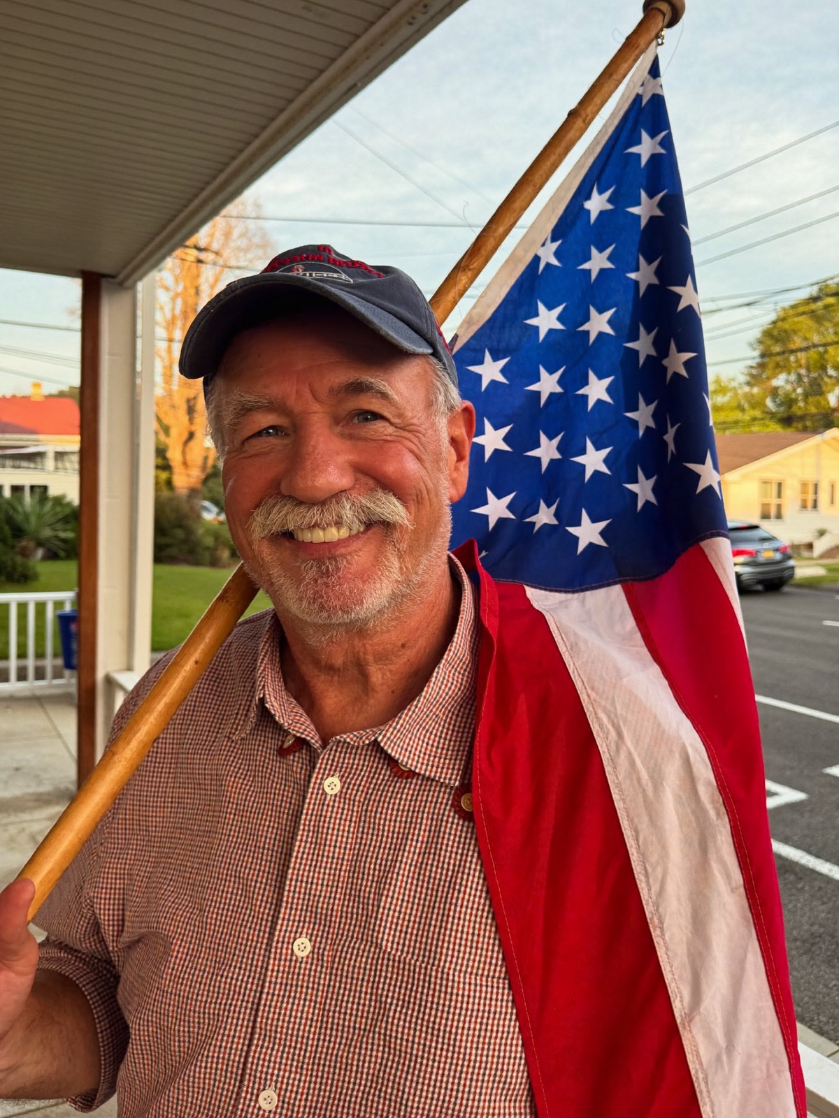 A proud patriot holding an American flag